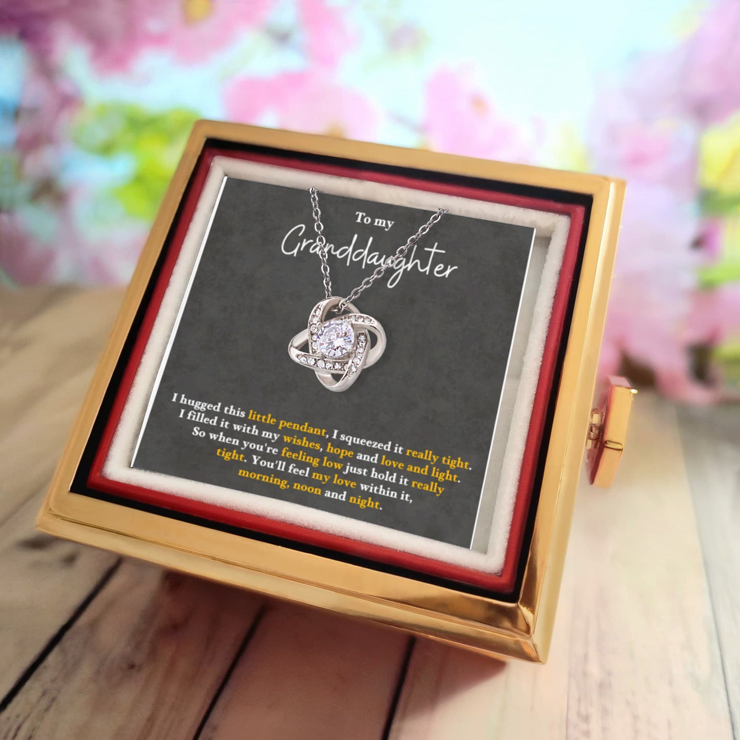 To My GranddaughterRotating Rose Box Love Knot Necklace