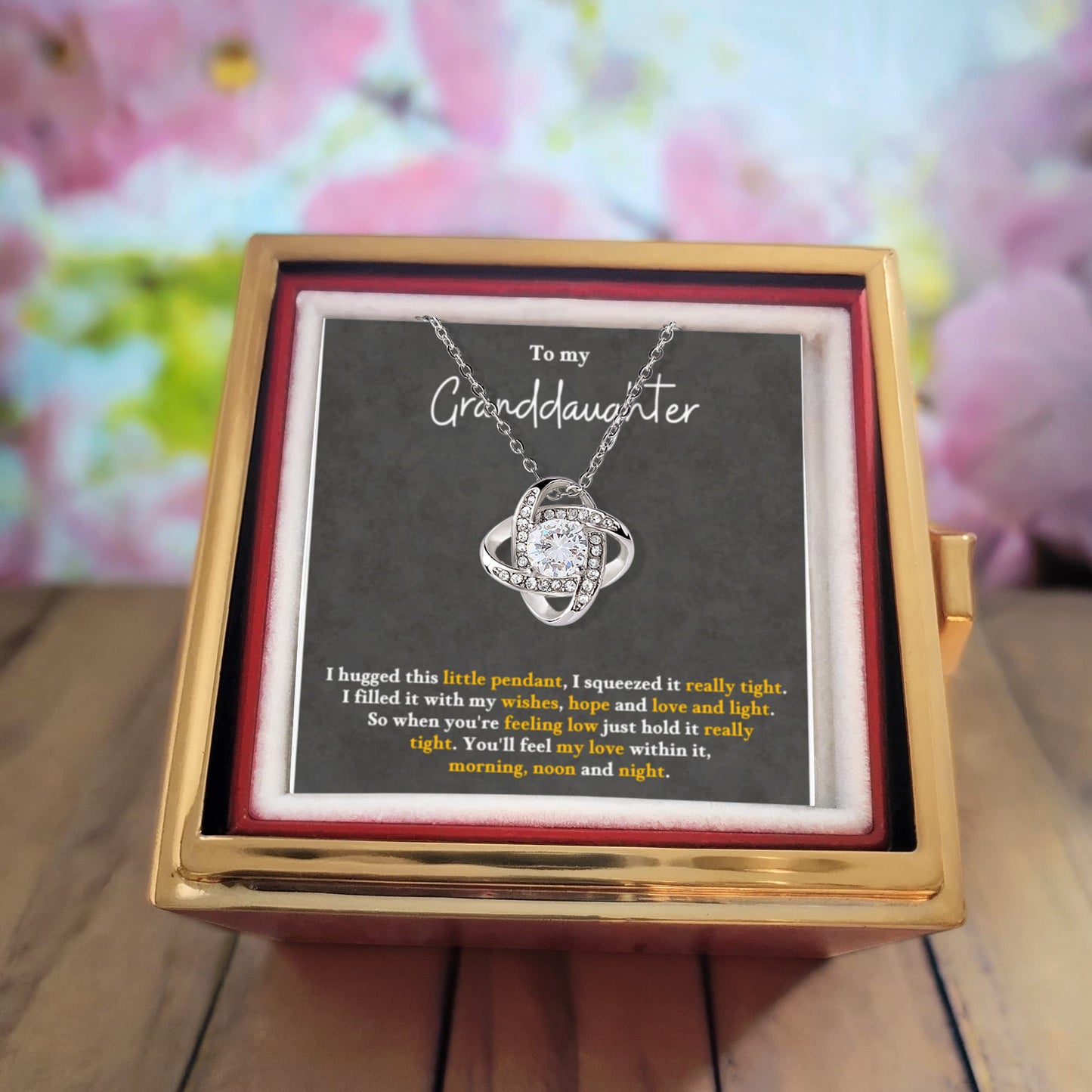 To My GranddaughterRotating Rose Box Love Knot Necklace